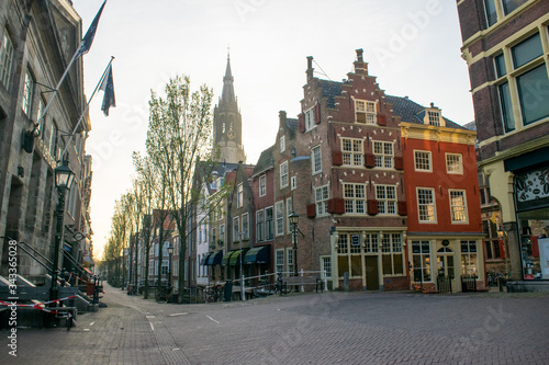 Morning view of the typical dutch houses in the centre of Delft.