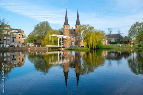A view from the canal of the Oostpoort (east gate) in the city of Delft. photo