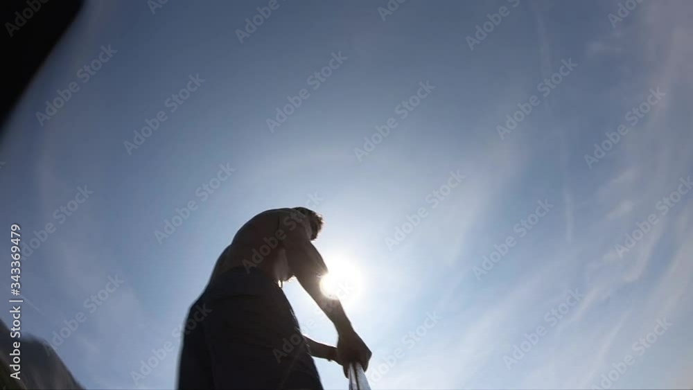 Young man on a paddleboard.
Unconventional shot of a paddling man. Camera mounted on a paddle.
Young man on a paddleboard.
Unconventional shot of a paddling man. Camera mounted on a paddle.