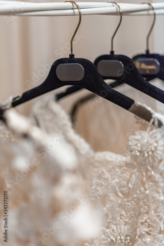 Wedding dresses hanging on a hanger. Fashion look.