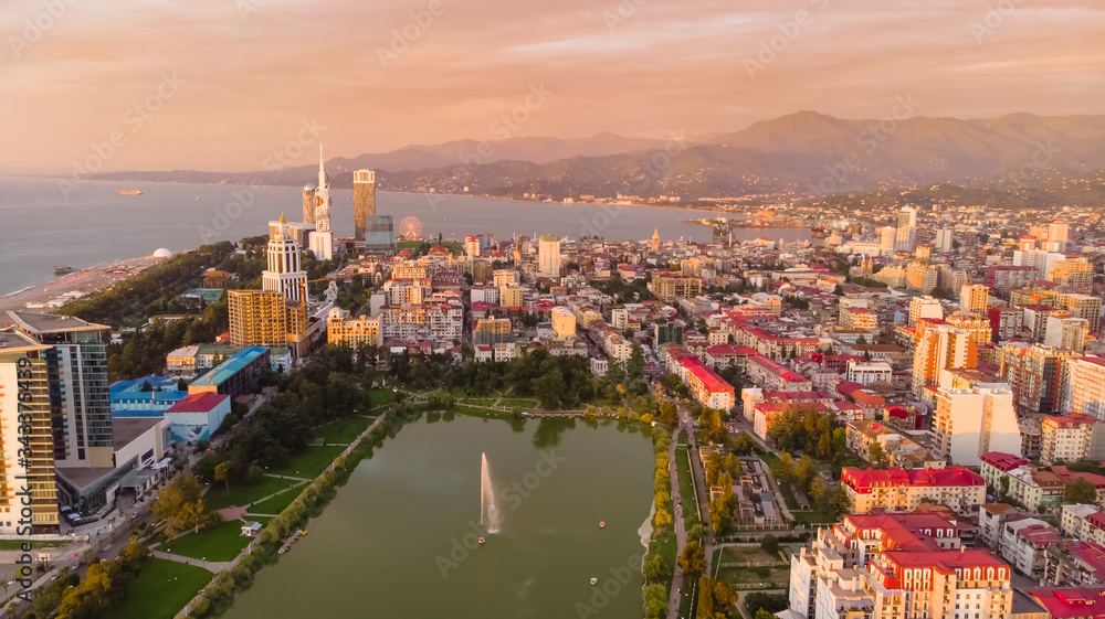 Aerial view of Batumi city with lake and port in sunset. Gerogia