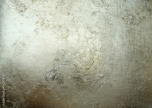 Golden-silver antique background with texture with roughness and flaws. Foil canvas texture; handmade flax. Handmade paper with potal.