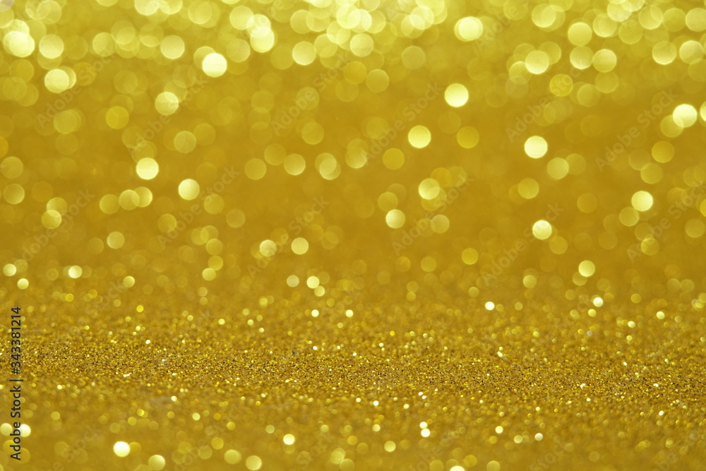 gold Sparkling Lights Festive background with texture. Abstract Christmas twinkled bright bokeh defocused and Falling stars. Winter Card or invitation gold Sparkling Lights Festive background with texture. Abstract Christmas twinkled bright bokeh defocused and Falling stars. Winter Card or invitation