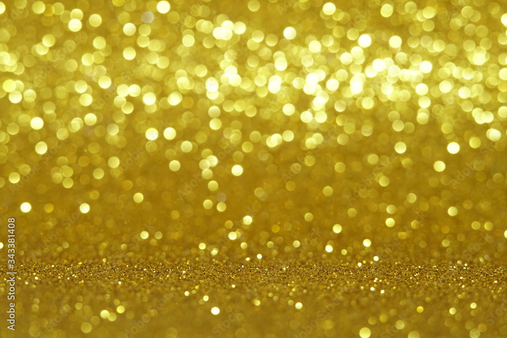 gold Sparkling Lights Festive background with texture. Abstract Christmas twinkled bright bokeh defocused and Falling stars. Winter Card or invitation gold Sparkling Lights Festive background with texture. Abstract Christmas twinkled bright bokeh defocused and Falling stars. Winter Card or invitation
