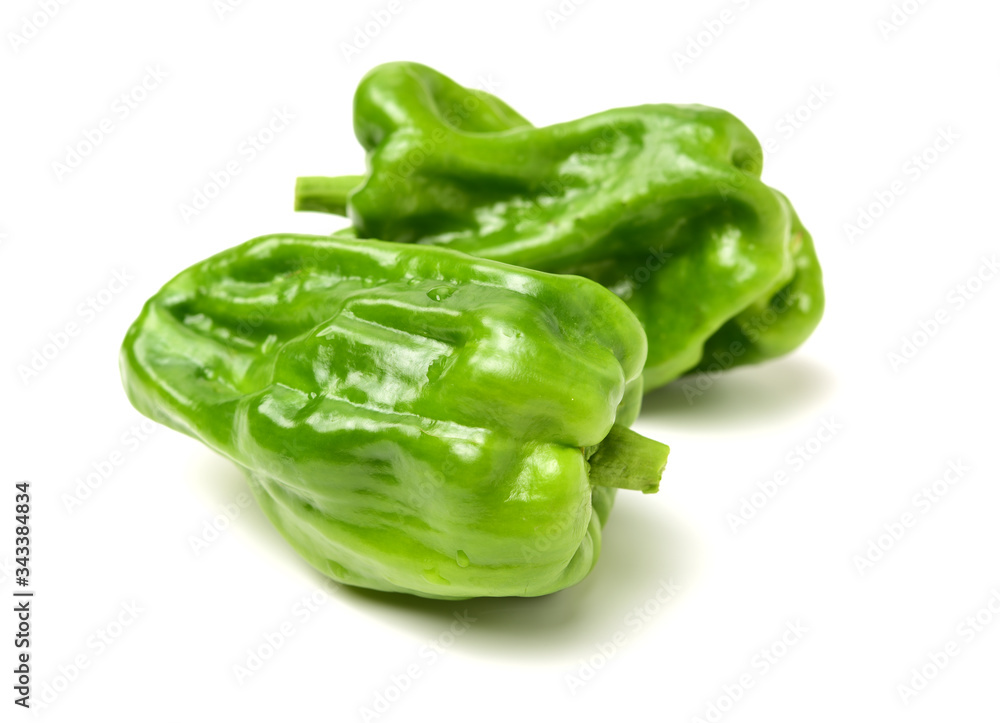 fresh green bell pepper (capsicum) on a white background fresh green bell pepper (capsicum) on a white background