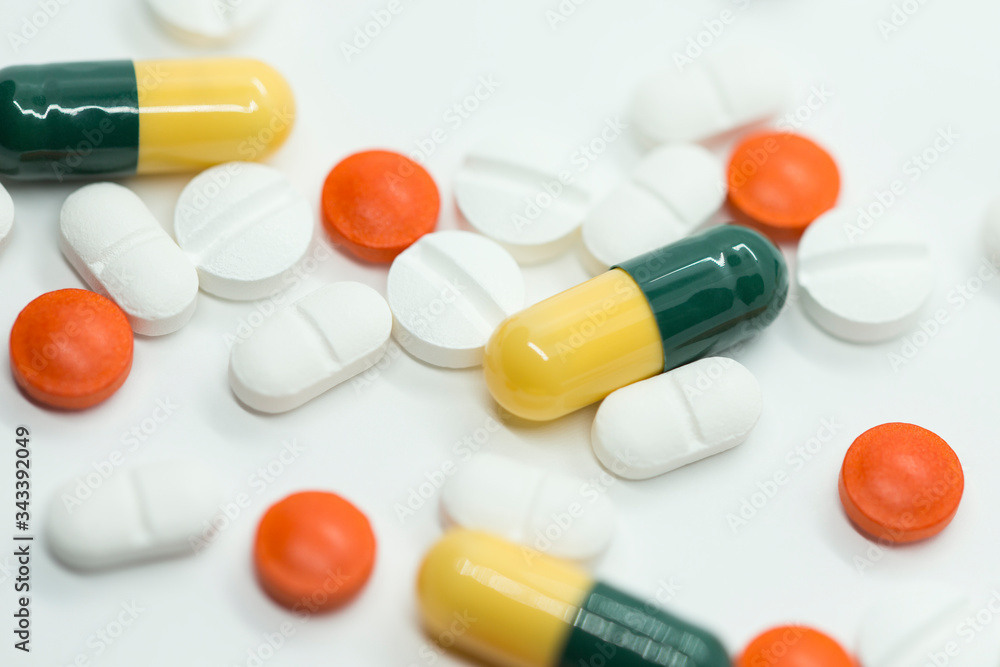 prescription pills on white background closeup
prescription pills on white background closeup
