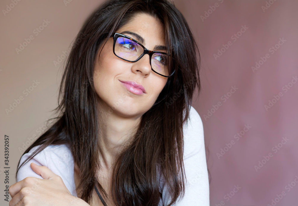 Beautiful Young Woman with Eyeglasses with Black Frames 