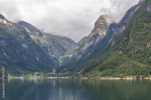 End of fjord. Beautiful Norwegian landscape. view of the fjords. Norway ideal fjord reflection in clear water In cloudy weather. selective focus © Tatiana