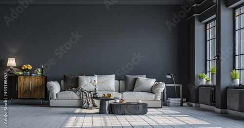 Modern interior design of a living room in an apartment, house, office, fresh flowers and bright modern interior details and sunbeams from a window on a background of dark walls.