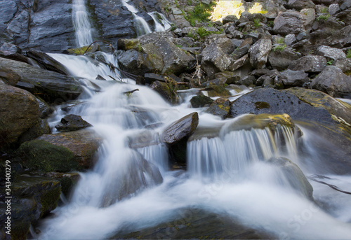 Waterfall on mountain river in Carpathian Mountains   Romania