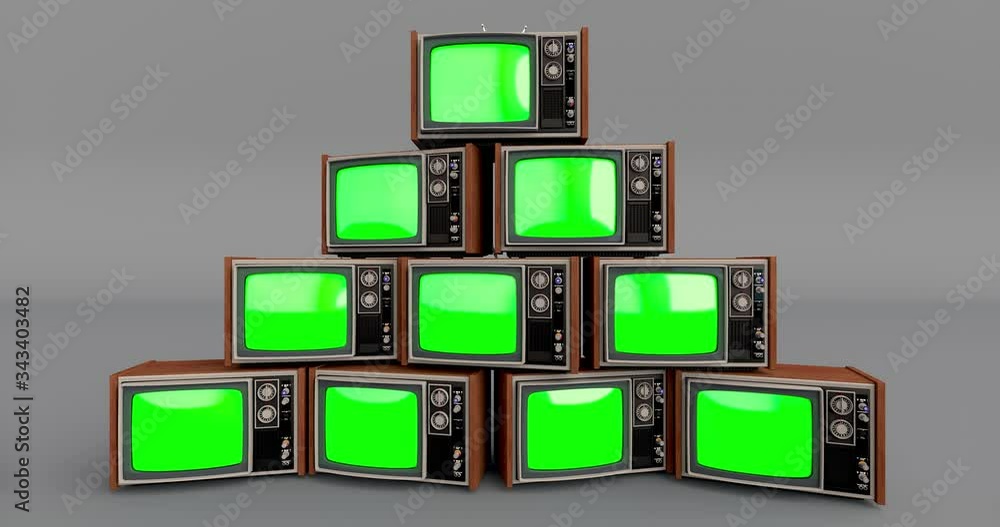 Pile of retro tvs with green screen turning on and off Stock Video