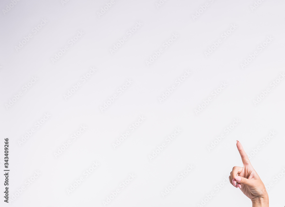 Couple pointing with fingers standing isolated over white background. Copy space for product advertisement. Couple pointing with fingers standing isolated over white background. Copy space for product advertisement.