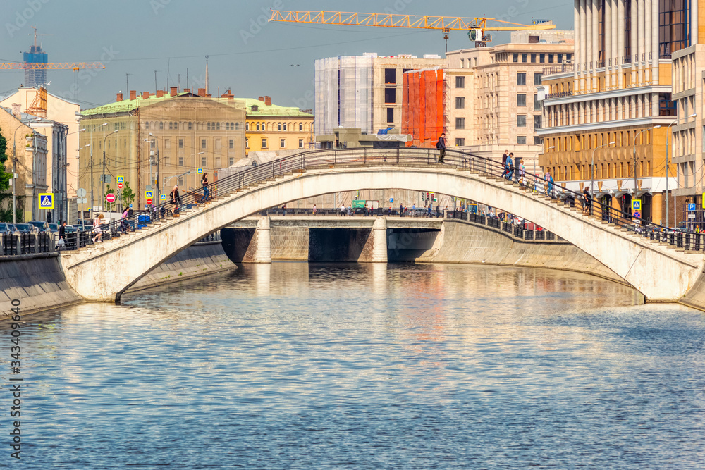 Naklejka premium Moscow, Russia. Sadovnichesky bridge over the Moscow river Bypass canal in Moscow in the spring on a Sunny morning