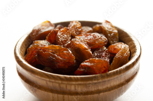 Golden raisins in the plate.