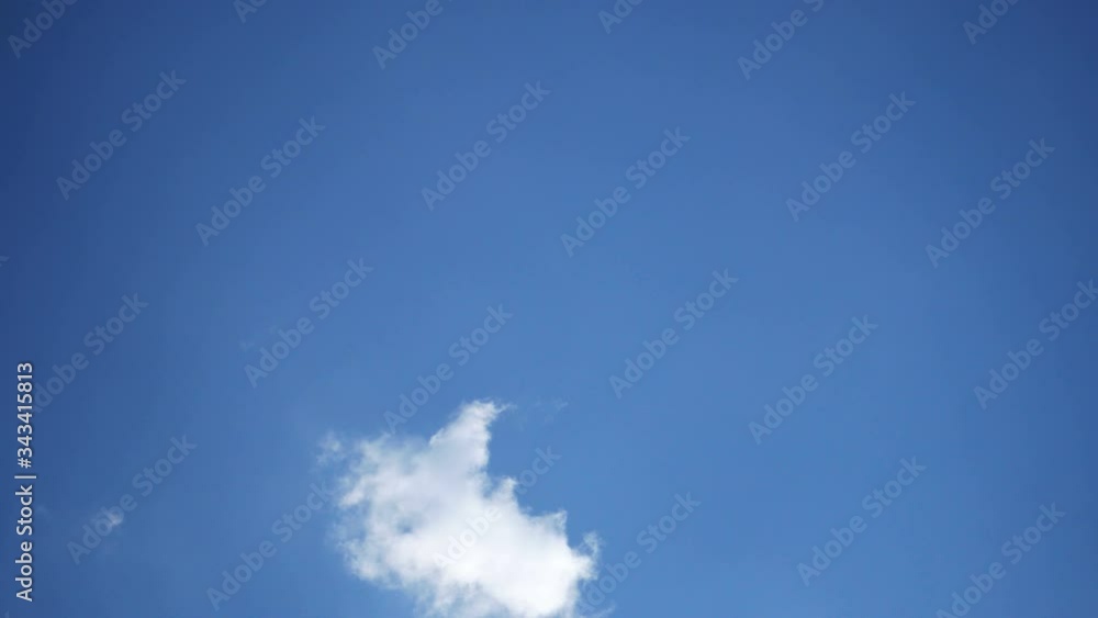 moving beautiful white cloud with blue sky background at day time moving beautiful white cloud with blue sky background at day time