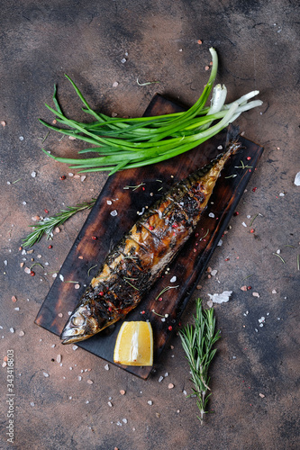 Grilled mackerel on a cutting board