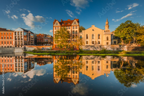 Spring view of city Opole in Silesia in Poland. Historical old town in gold light.