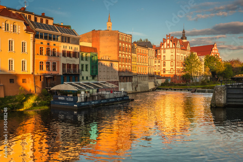 Spring view of city Opole in Silesia in Poland. Historical old town in gold light.