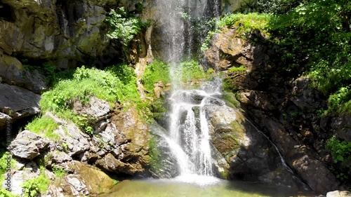 Hiden waterfall in untouched nature near city of Gornji Vakuf in Bosnia and Herzegovina photo