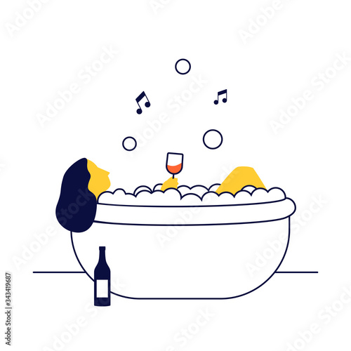 Hermosa joven disfrutando de un baño agradable con espuma y con una copa de vino.  Concepto de relajación y spa. photo