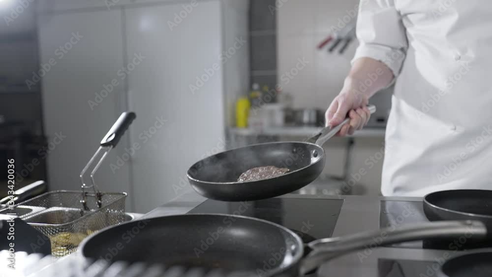 HD UHD 25p ProRes HQ 422 ,
chef cooks a steak with blood in an open fire in a kitchen HD UHD 25p ProRes HQ 422 ,
chef cooks a steak with blood in an open fire in a kitchen