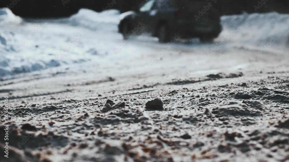 Close up detail of car drift in snowy street. Wheels raise up the mud and snow. Sport race transport in wintertime. Speed riding, gas burning. Drag racing car burn tire at start line. Vehicle concept Close up detail of car drift in snowy street. Wheels raise up the mud and snow. Sport race transport in wintertime. Speed riding, gas burning. Drag racing car burn tire at start line. Vehicle concept