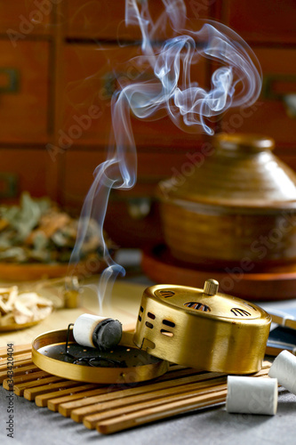 Chinese copper moxibustion box with smoke on bamboo 