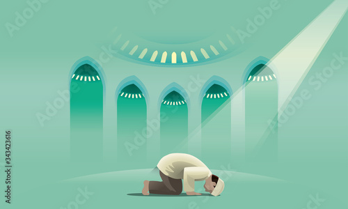 A devout Muslim praying in a holy mosque.