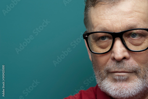 Close-up portrait of positive handsome man