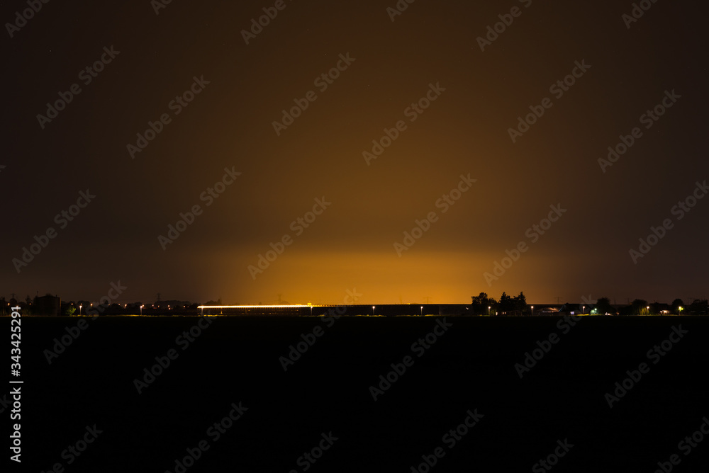Night time image of light pollution by illuminated greenhouses in the western part of The Netherlands