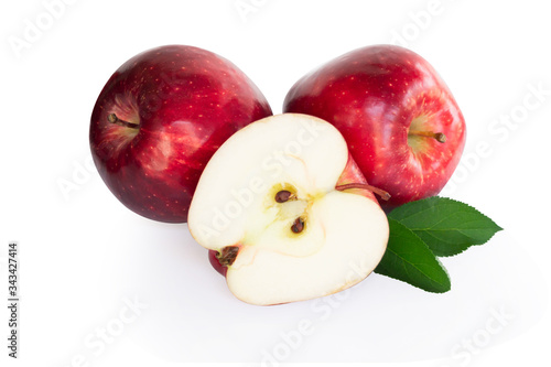 Fresh red apple fruit with green leaf isolated on white background, Healthy food concept