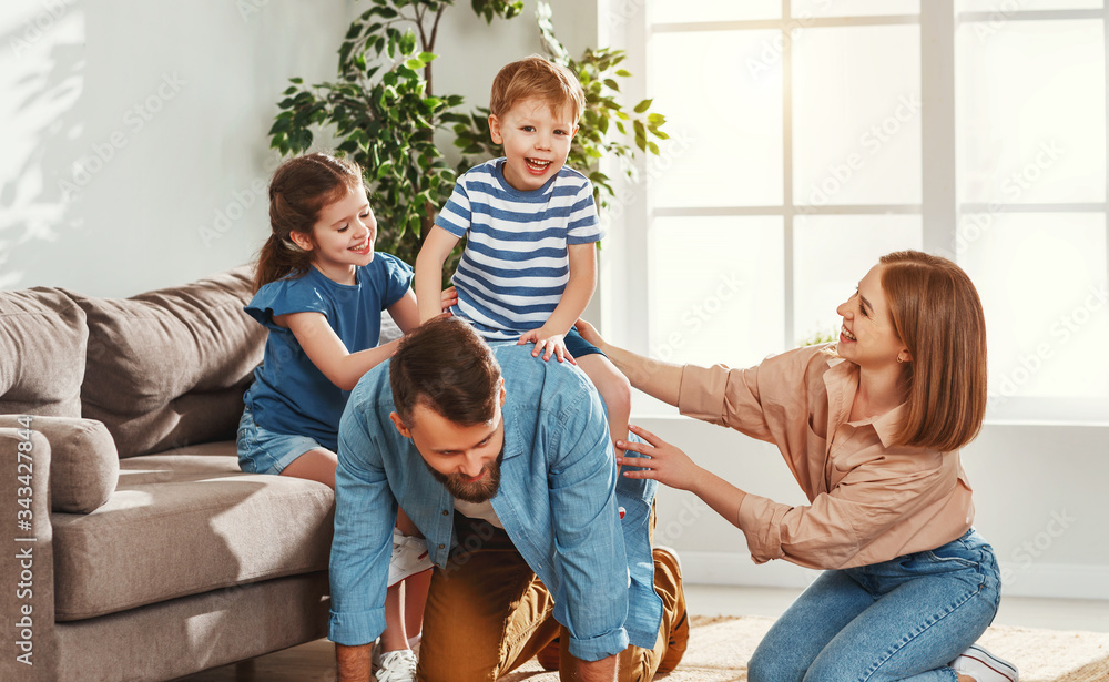 Happy family having fun at home Happy family having fun at home