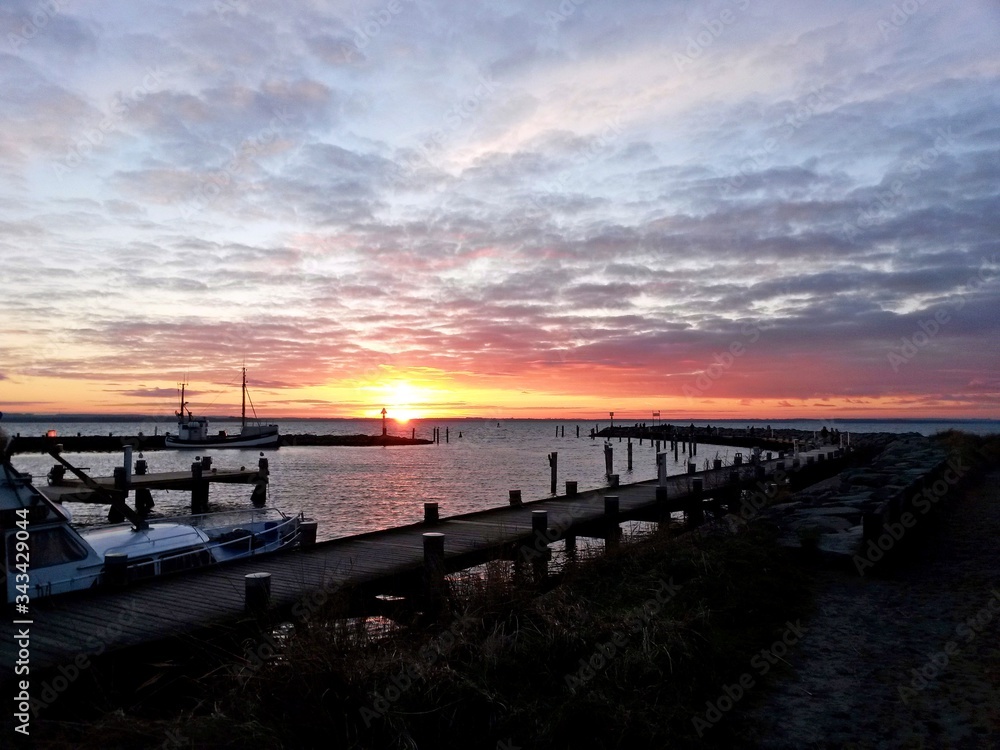 Obraz premium sunset at the pier on Poal Island Germany