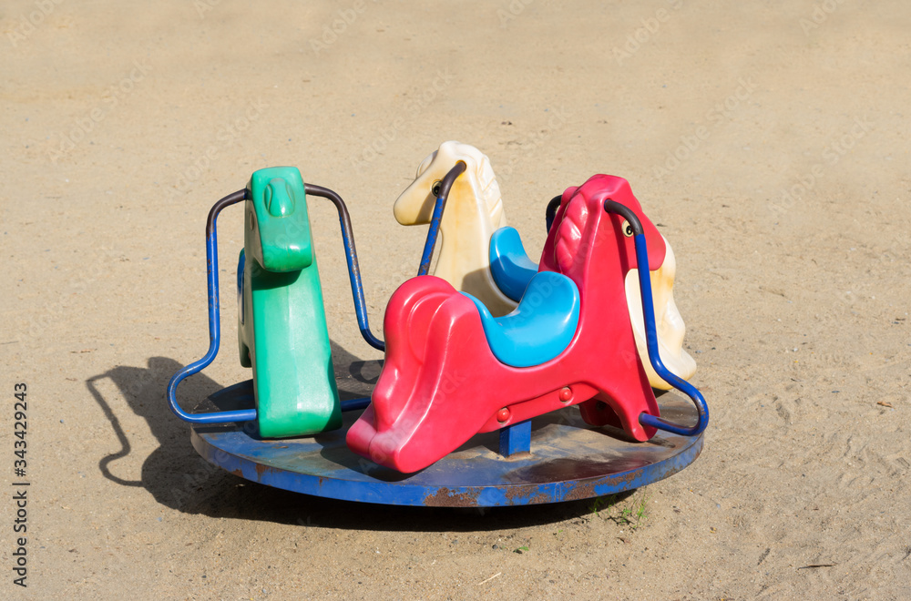 Horses shape carousel for children in playground. Horses shape carousel for children in playground.