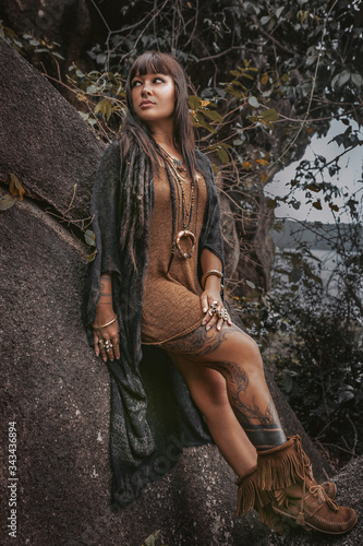 beautiful young stylish tribal style woman outdoors © zolotareva_elina