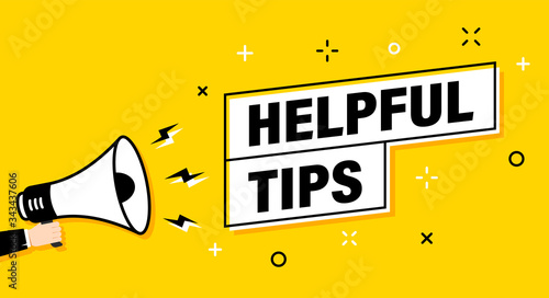 Male hand holding megaphone with Helpful Tips speech bubble. Loudspeaker. Banner for business, marketing and advertising. Vector illustration.