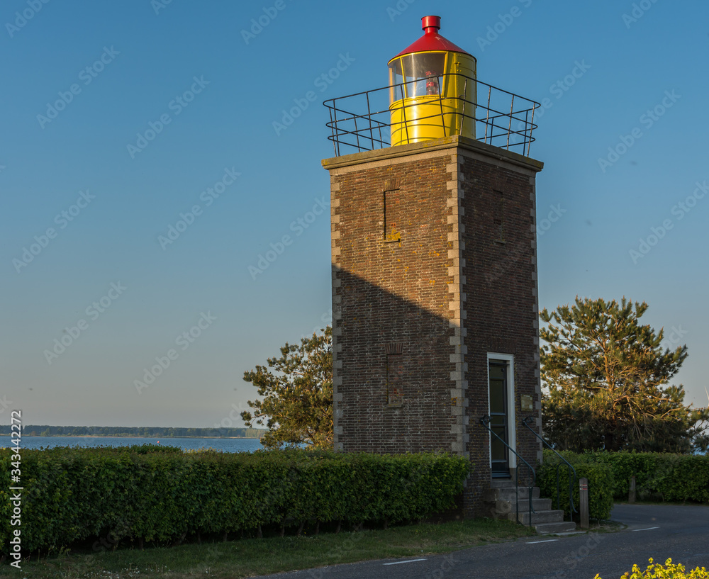 Lighthouse of Willemstad, North Brabant, The Netherlands. Built in 1947, now serving as a mini museum Lighthouse of Willemstad, North Brabant, The Netherlands. Built in 1947, now serving as a mini museum