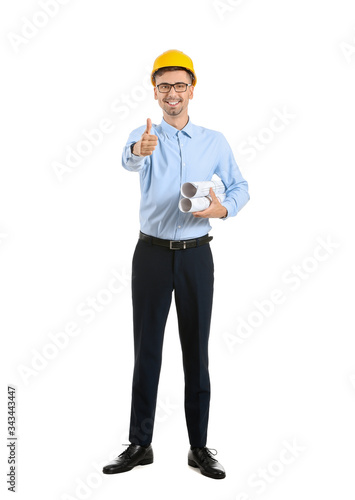 Portrait of architect showing thumb-up gesture on white background