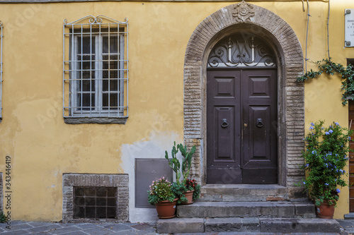 An old doorway in the city of Lucca, Tuscany, Italy. © julianelliott