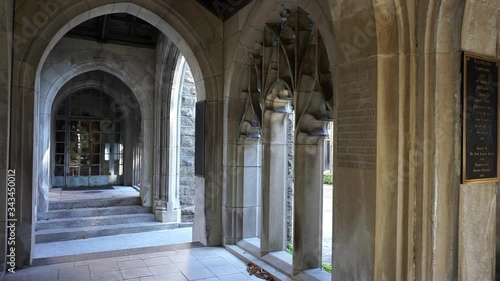 Arched cloisters and doorway to adjoining church. photo