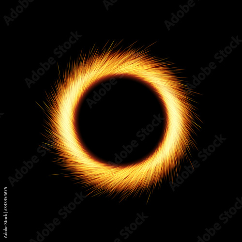 Shining circle with orange sparkles and glowing lights on black background photo
