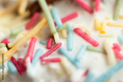 Confectionery multi-colored decorative topping on the glaze of Easter baking.