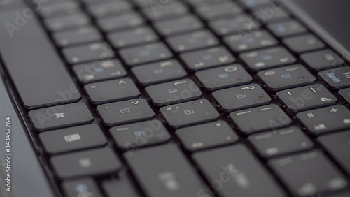 Closeup the laptop keyboard . Working or studying online concept. 