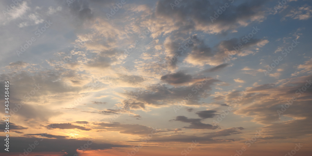 Dramatic sunset sky. Cloudy sky as a background.