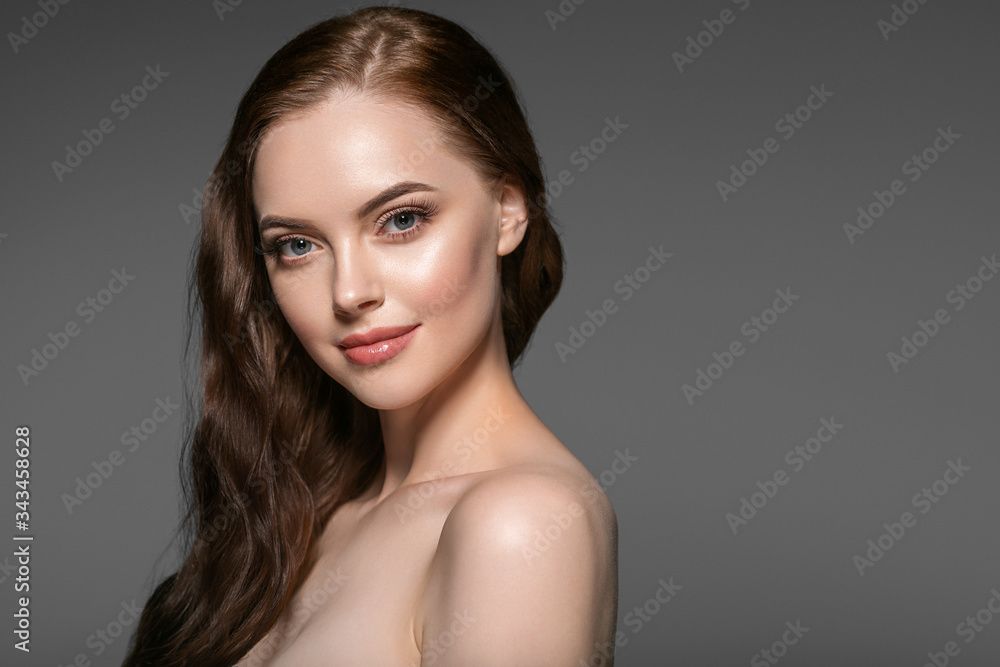 Beautiful woman face long healthy hair natural skin care make up beauty