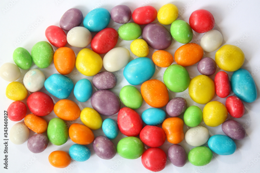 Background from multi-colored sweets. Close-up. Background from multi-colored sweets. Close-up.
