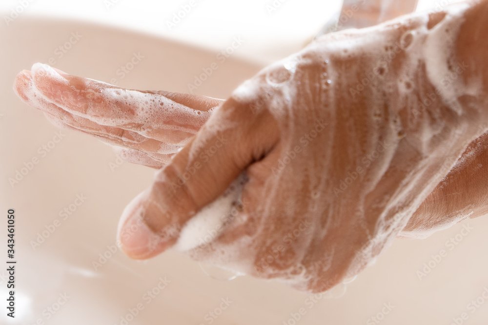Thoroughly washing hands with soap Thoroughly washing hands with soap