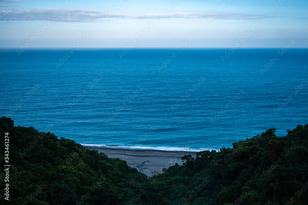 tropical sea beach scene, blue color of ocean