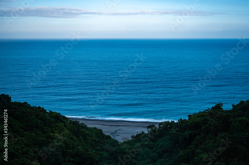 tropical sea beach scene, blue color of ocean