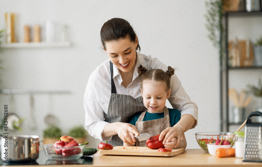 Happy family in the kitchen.